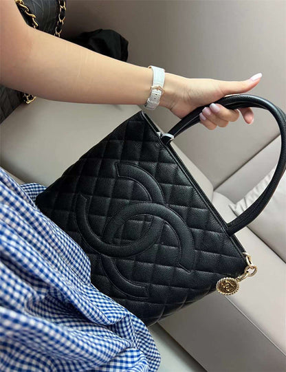 Chanel inspired Caviar Medallion Tote in black bag