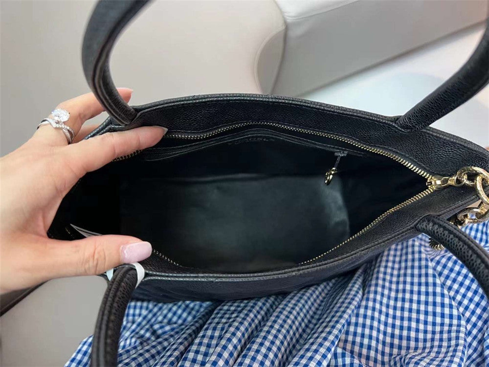 Chanel inspired Caviar Medallion Tote in black bag
