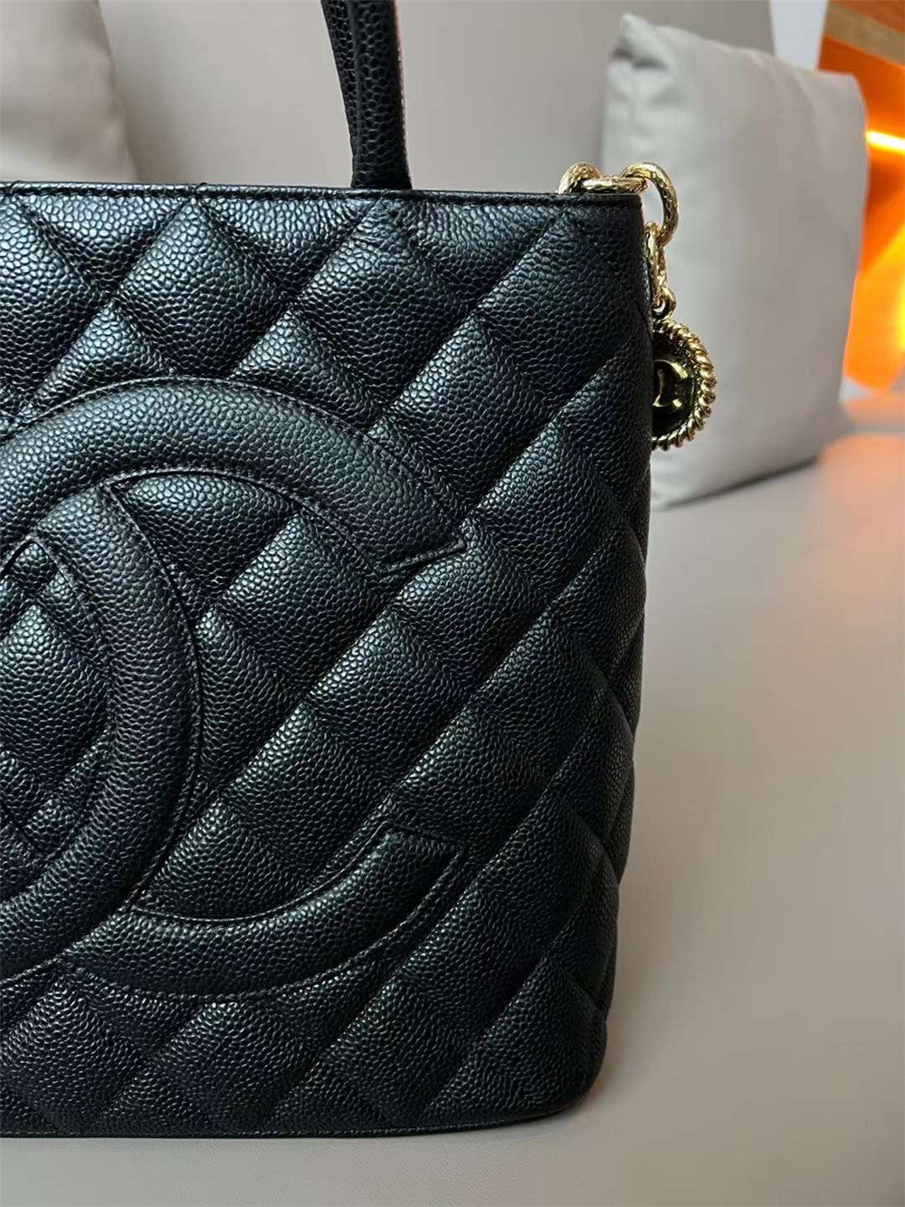 Chanel inspired Caviar Medallion Tote in black bag