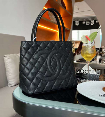 Chanel inspired Caviar Medallion Tote in black bag